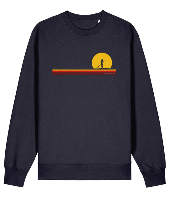 Midnight Navy dark blue Nanook23 First Light organic cotton sweatshirt with a paddleboarder silhouetted against a yellow sun above stripes of yellow, orange and red.