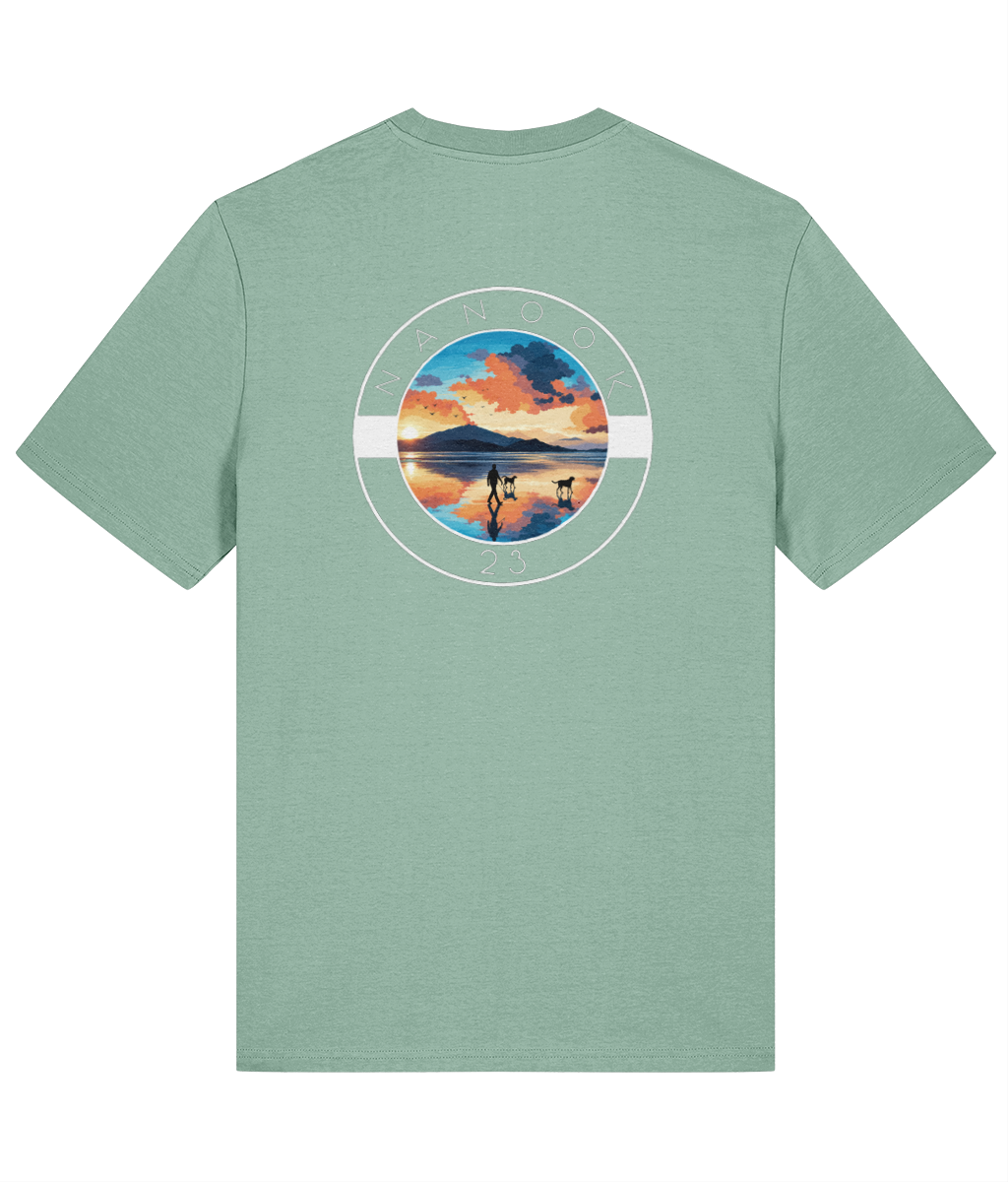 Back of the Sage Green soft green Nanook23 Beach Walk t-shirt with a large print of a person walking two dogs across a beach at sunrise.