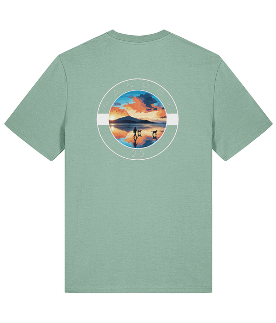 Back of the Sage Green soft green Nanook23 Beach Walk t-shirt with a large print of a person walking two dogs across a beach at sunrise.