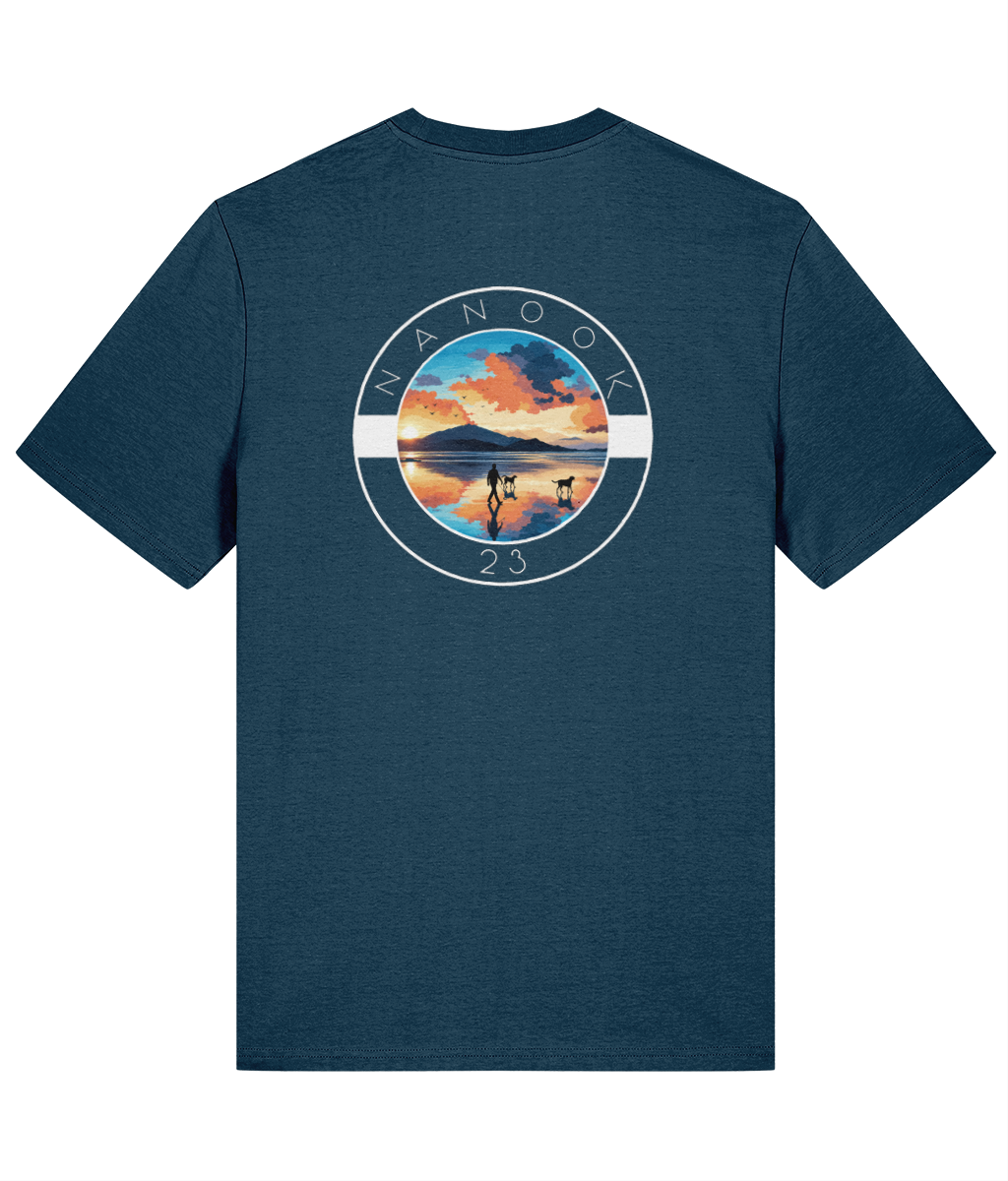 Back of the Fathom Teal dark teal Nanook23 Beach Walk t-shirt with a large print of a person walking two dogs across a beach at sunrise.