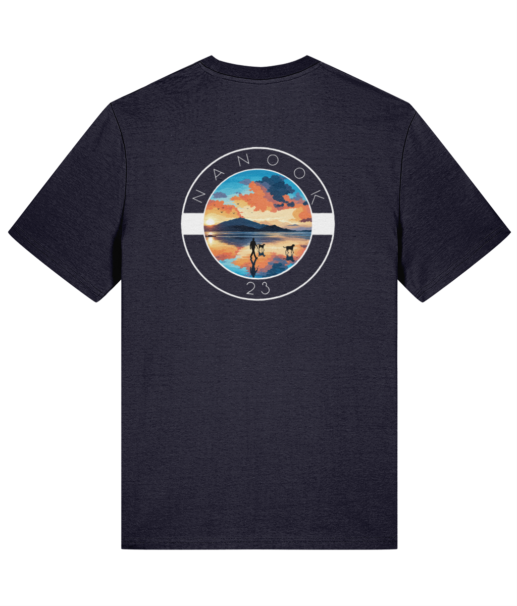 Back of the Midnight Navy dark blue Nanook23 Beach Walk t-shirt with a large print of a person walking two dogs across a beach at sunrise.